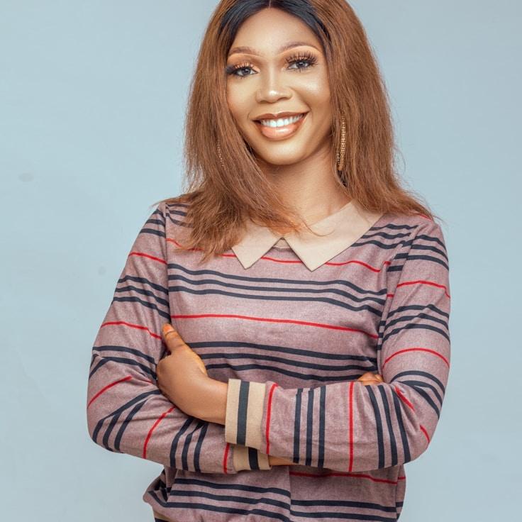 Aria Kapoor, Client Relations Director, discussing corporate gifting strategy with business clients